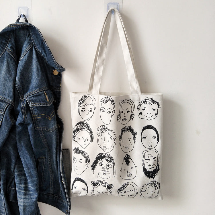 The Many Faces Tote Bag